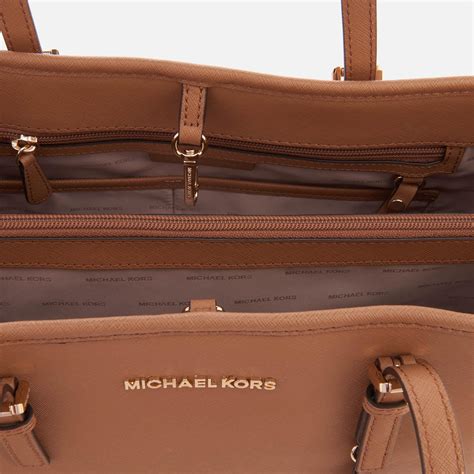 michael kors jet set tote size comparison|michael kors large travel bag.